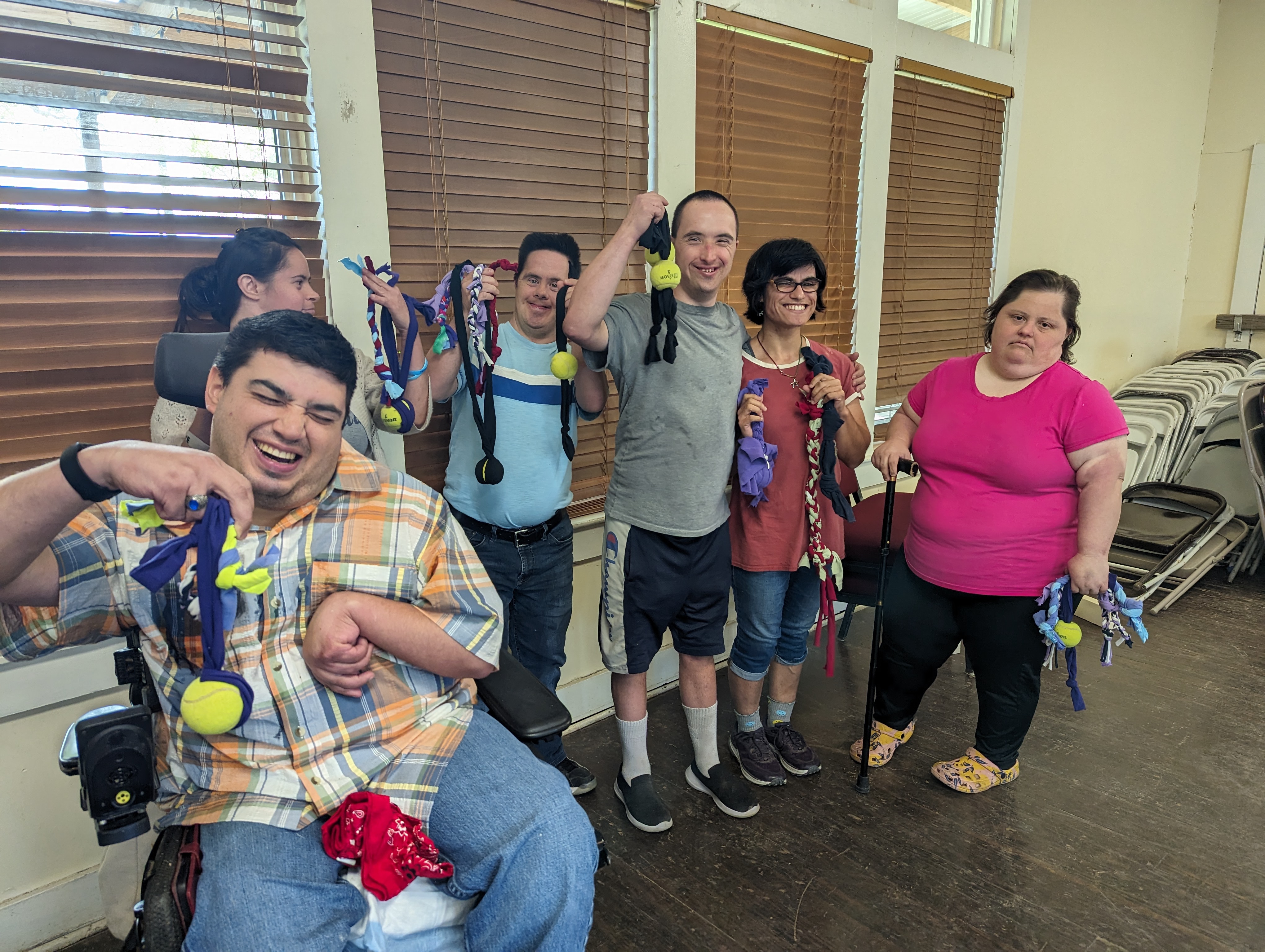 Group of mentally disabled adults taking selfie